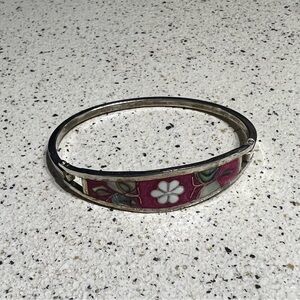 Silver bangle with floral details